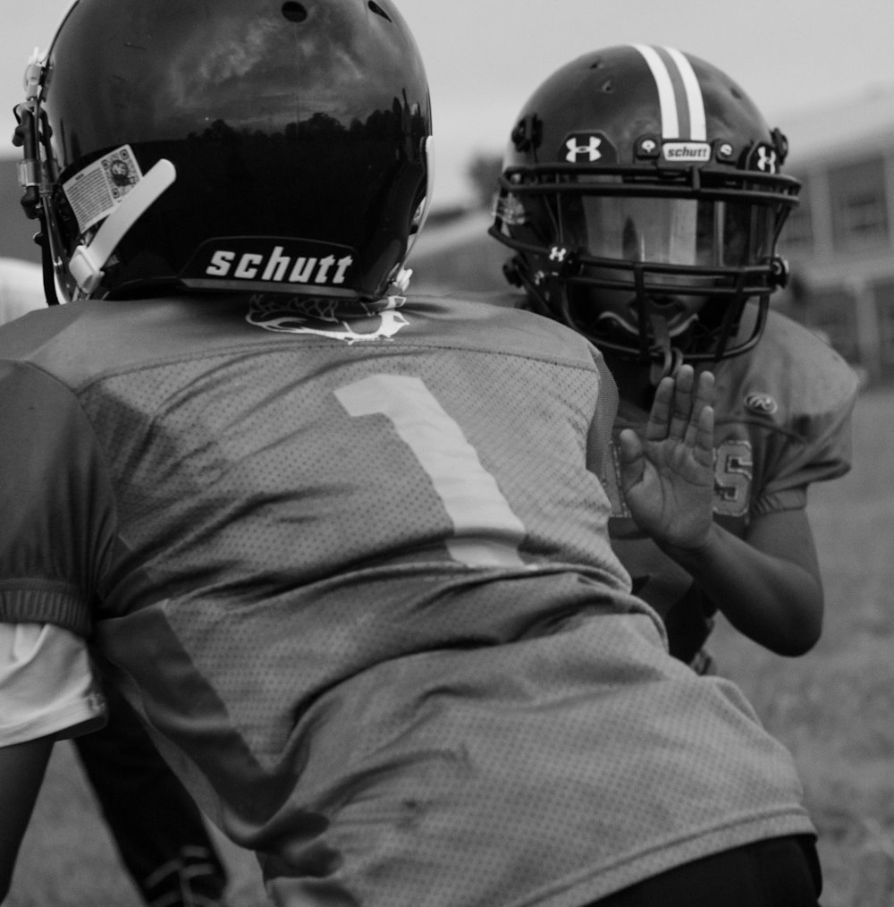 two persons playing American football