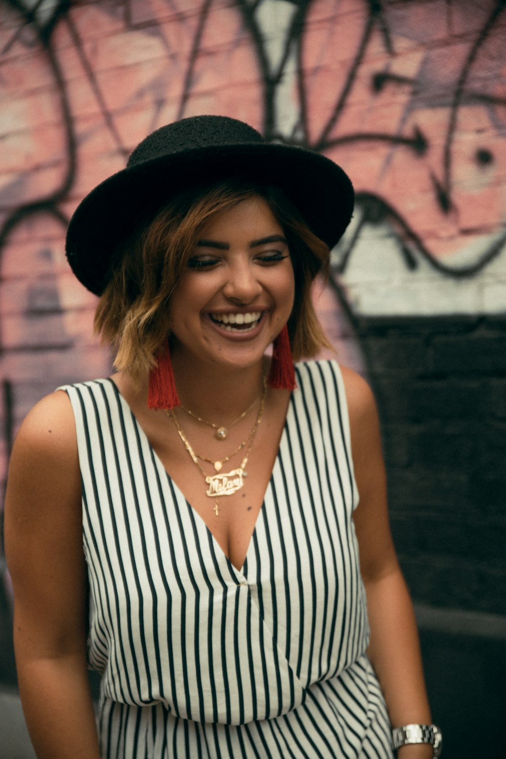 woman in black and white tank rompers