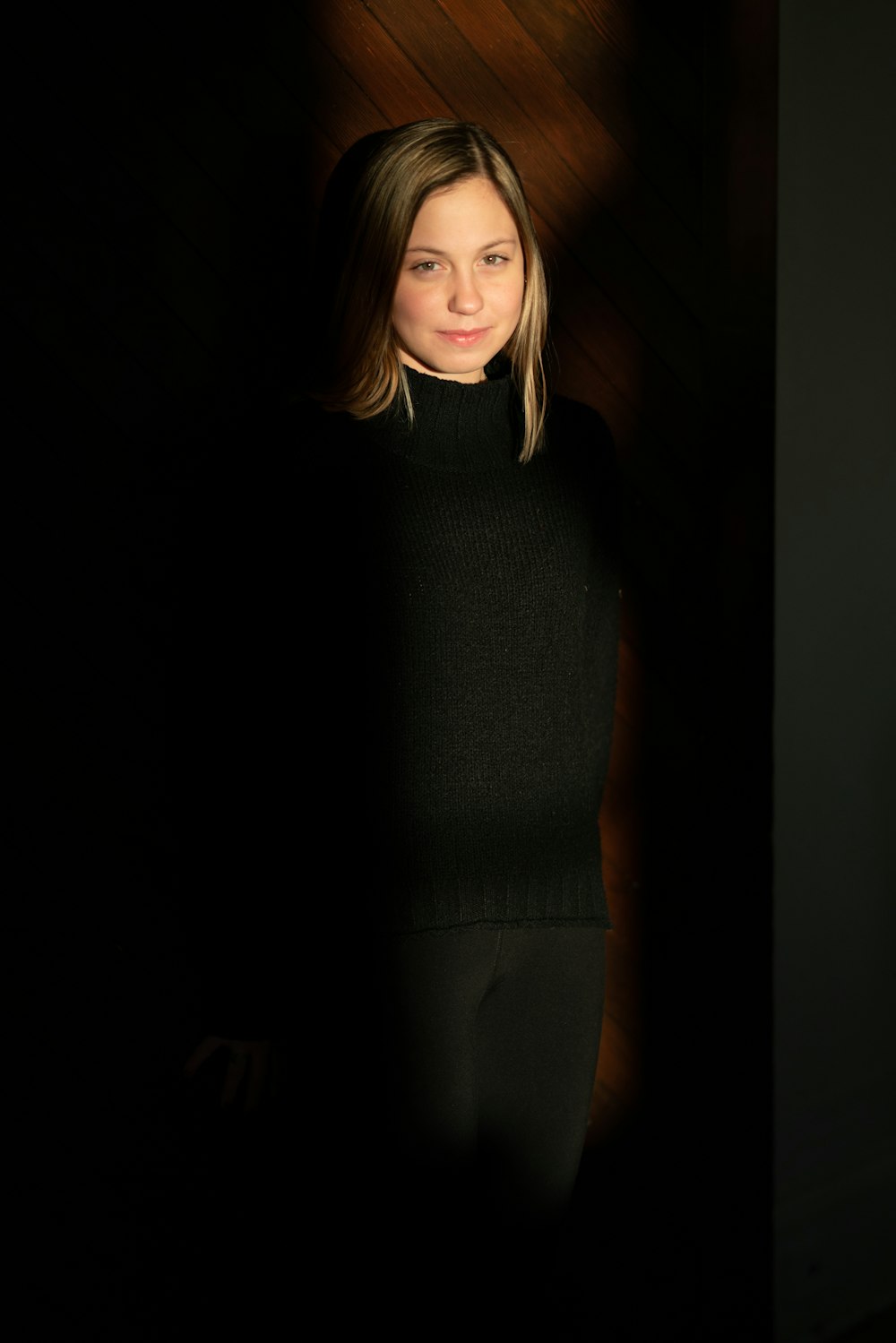 woman in black sweater