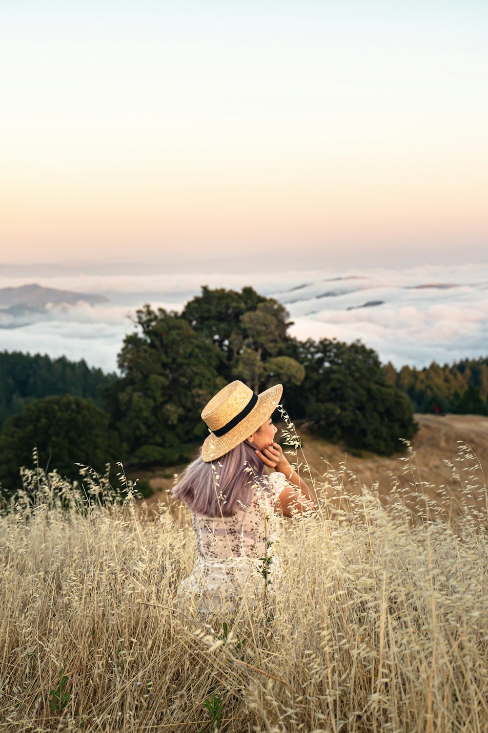 woman wearing brown hat