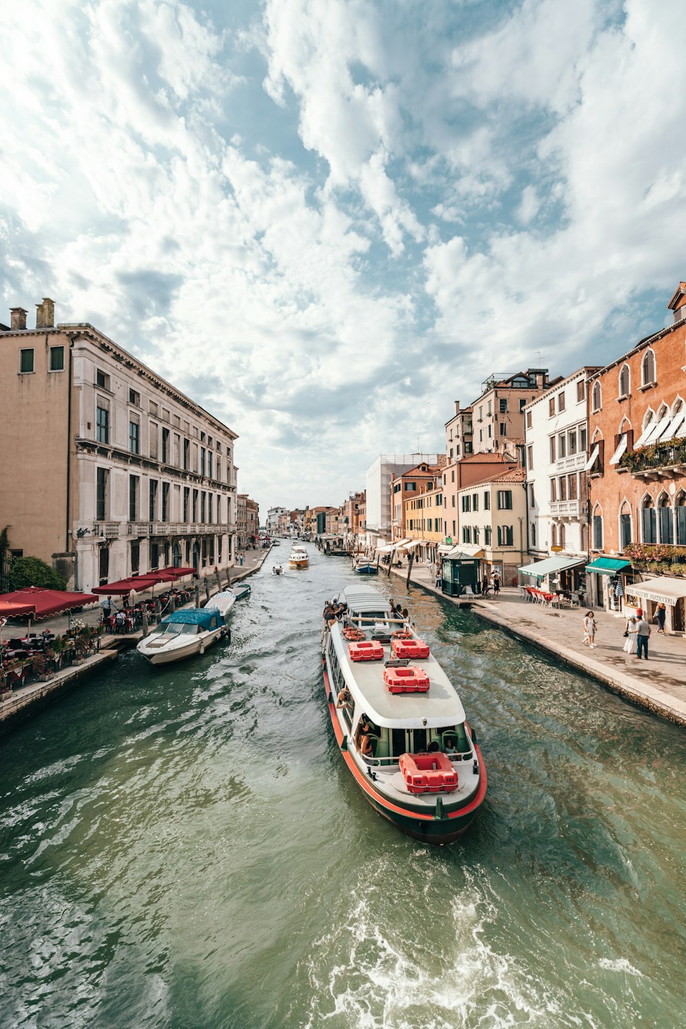 close-up photography of boat near buildings