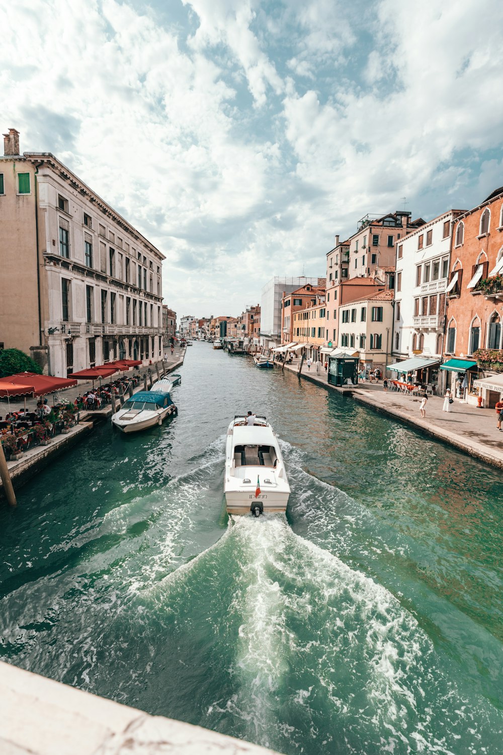 white boat on canal