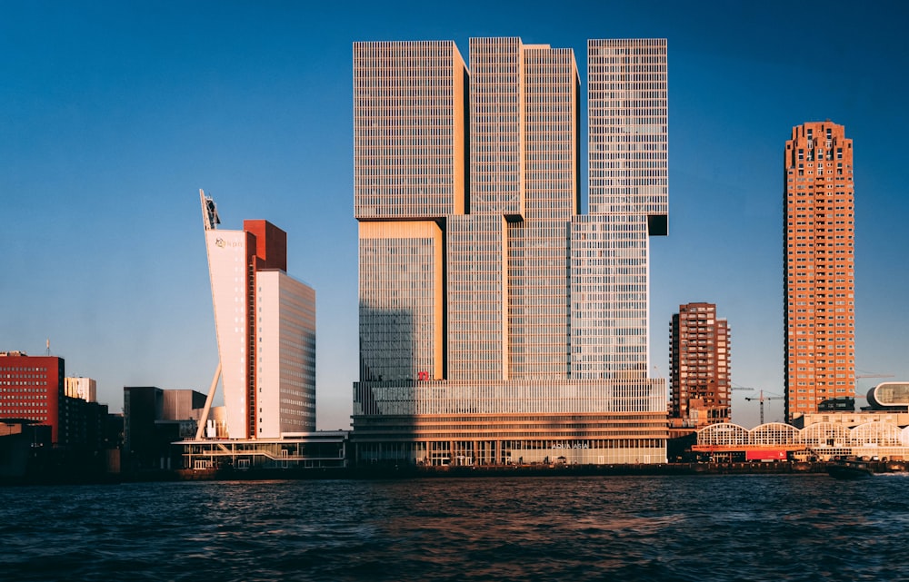 gray concrete building near body of water