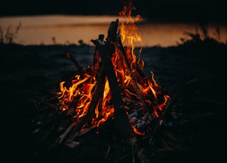 bonfire in green field during night time