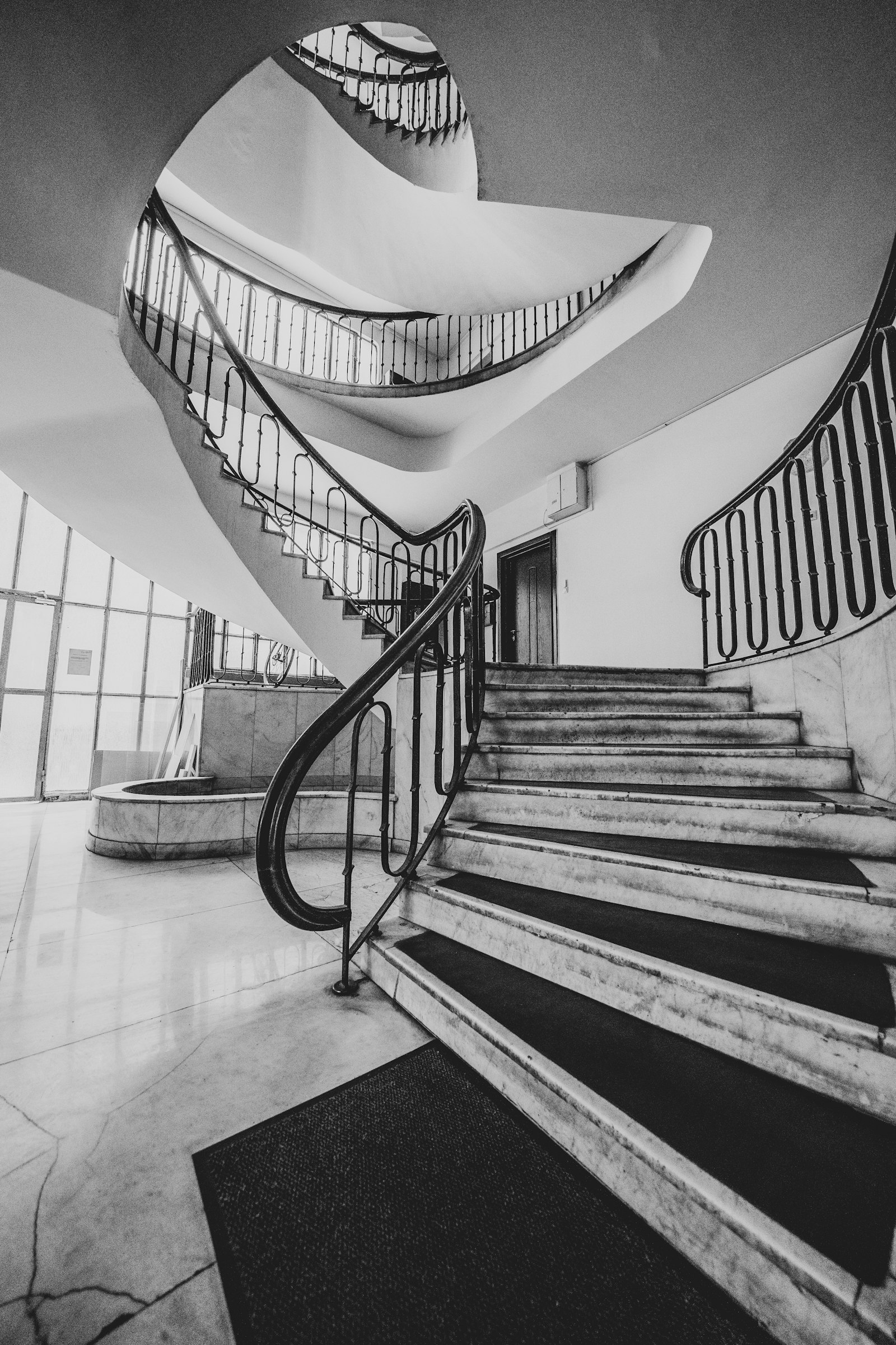 Sony a7 III + Sony FE 12-24mm F4 G sample photo. Grayscale photo of stairs photography