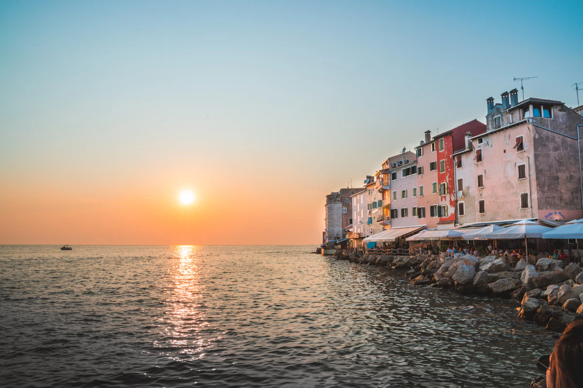 Rovinj old town at sunset, seen from the Adriatic