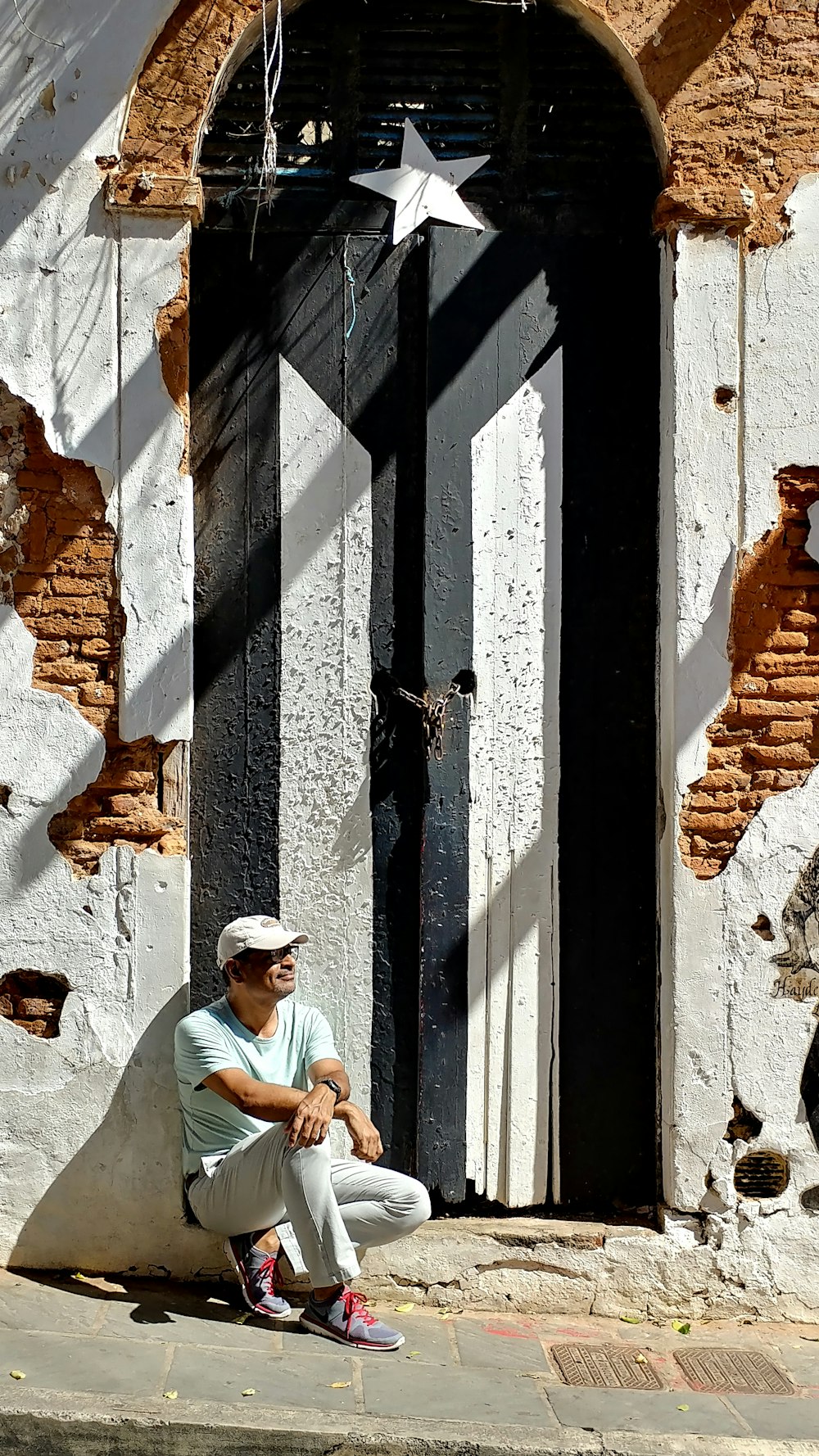 man on front of door