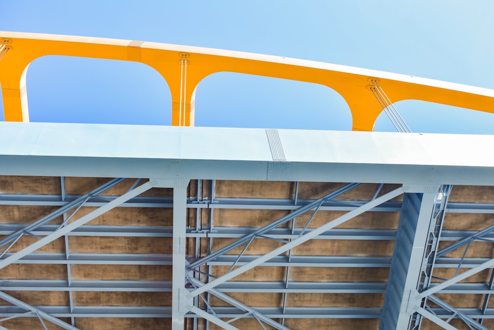 white and orange steel frame