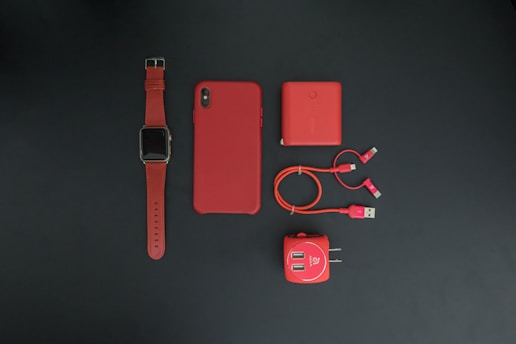 Close-up of colorful smartphone accessories neatly arranged on a tech-themed background