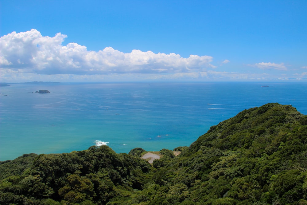 mountain ranges beside body of water