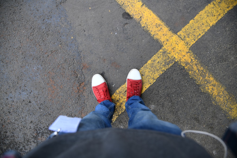 white-and-red low-top sneakers