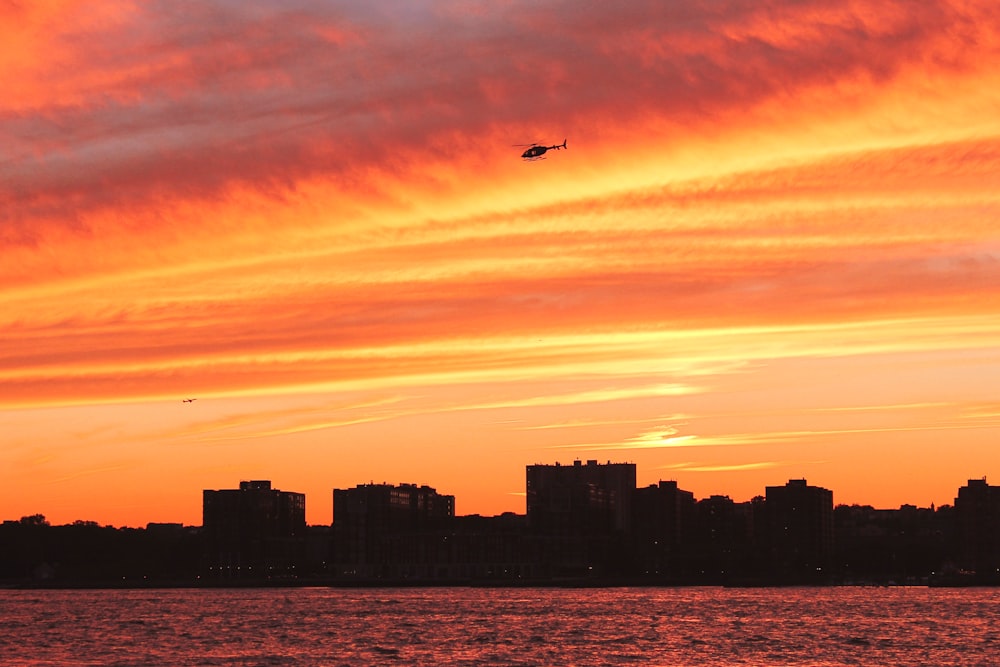 silhouette of buildings during golden hour