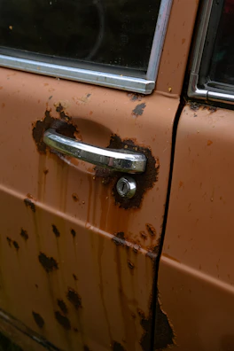 Rust spots forming on the door frame of a Focus MK2.