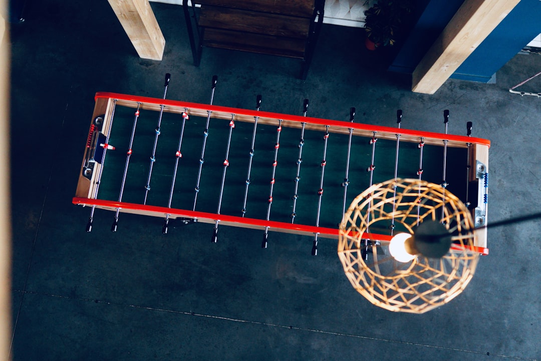 red and blue fossball table