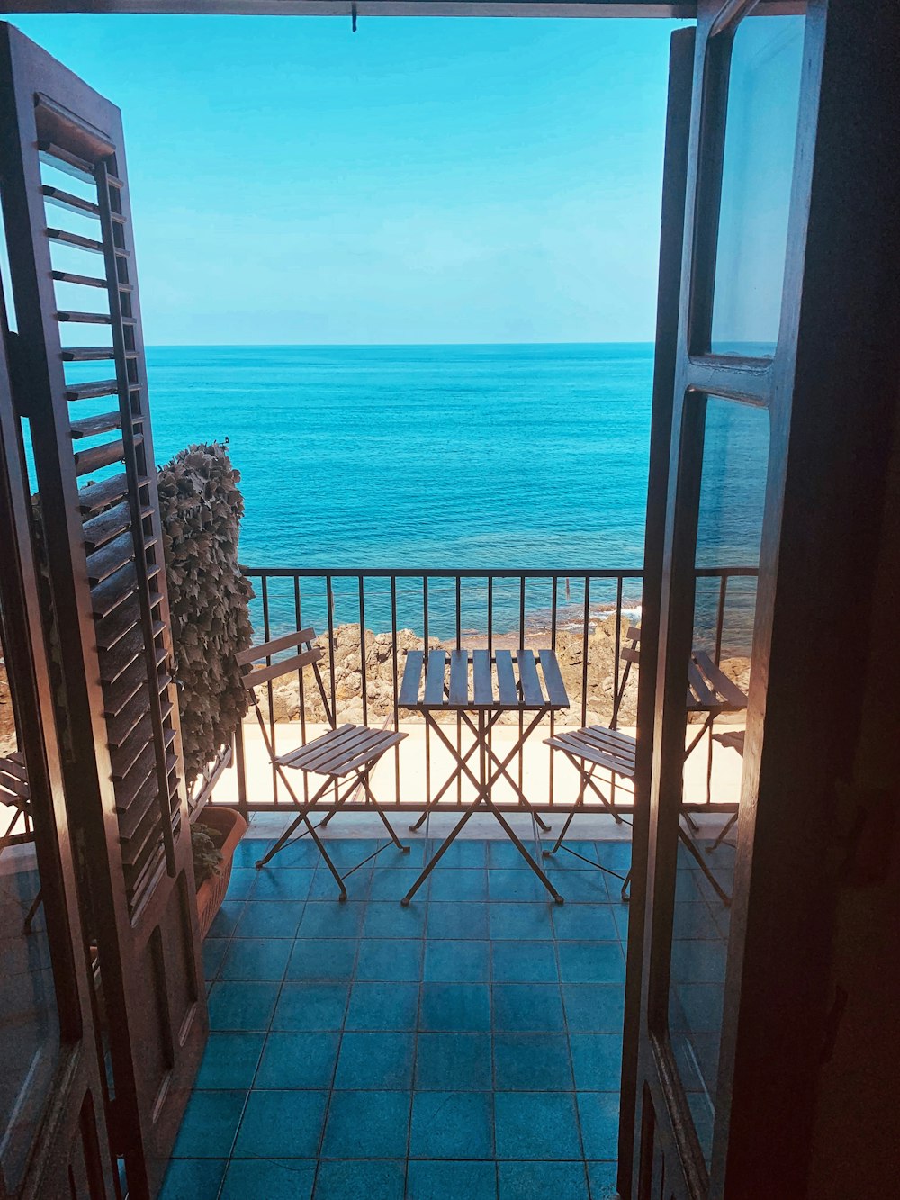 brown wooden framed and clear glass door