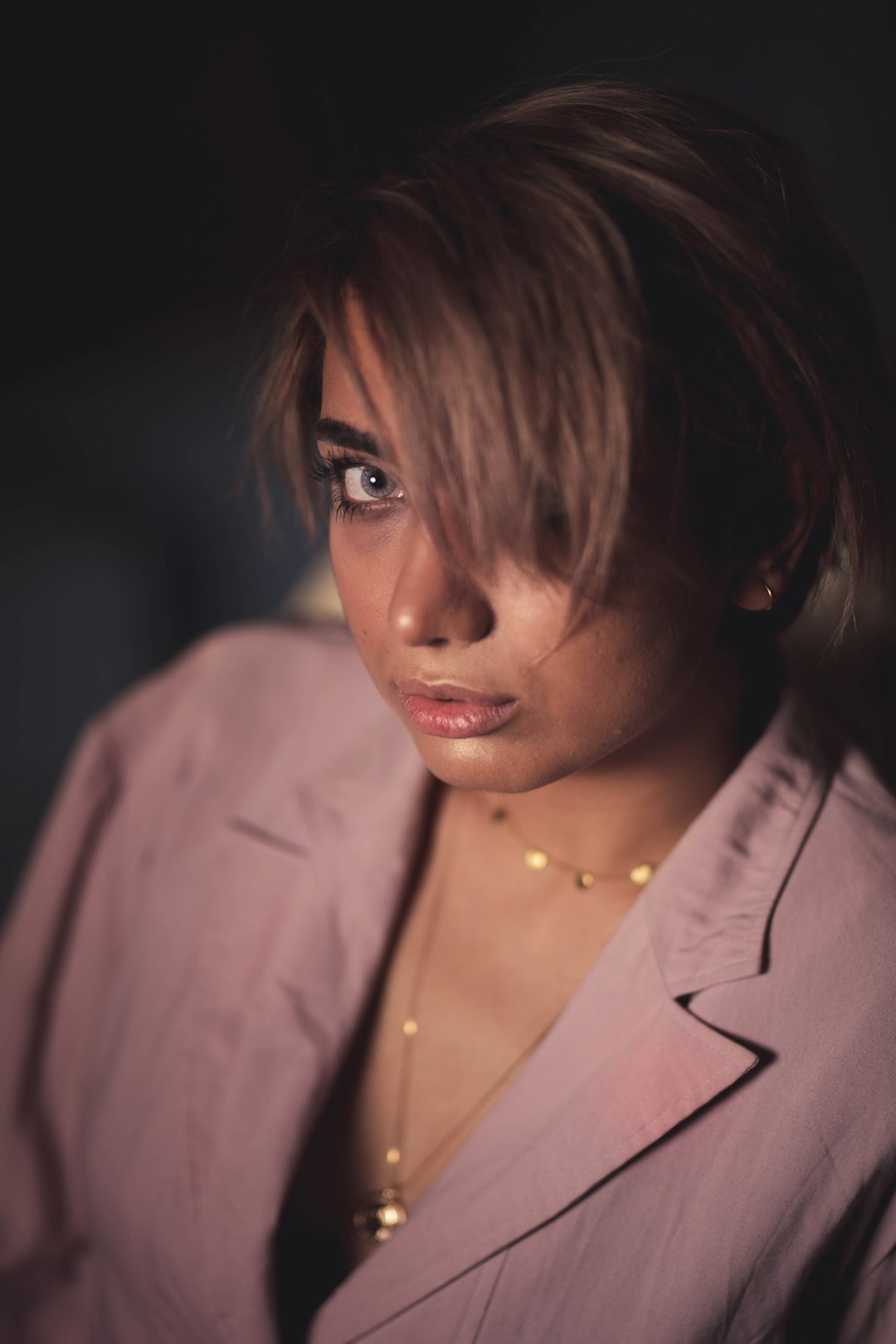 woman wearing purple blazer