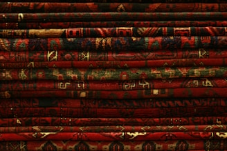 stack of red textiles