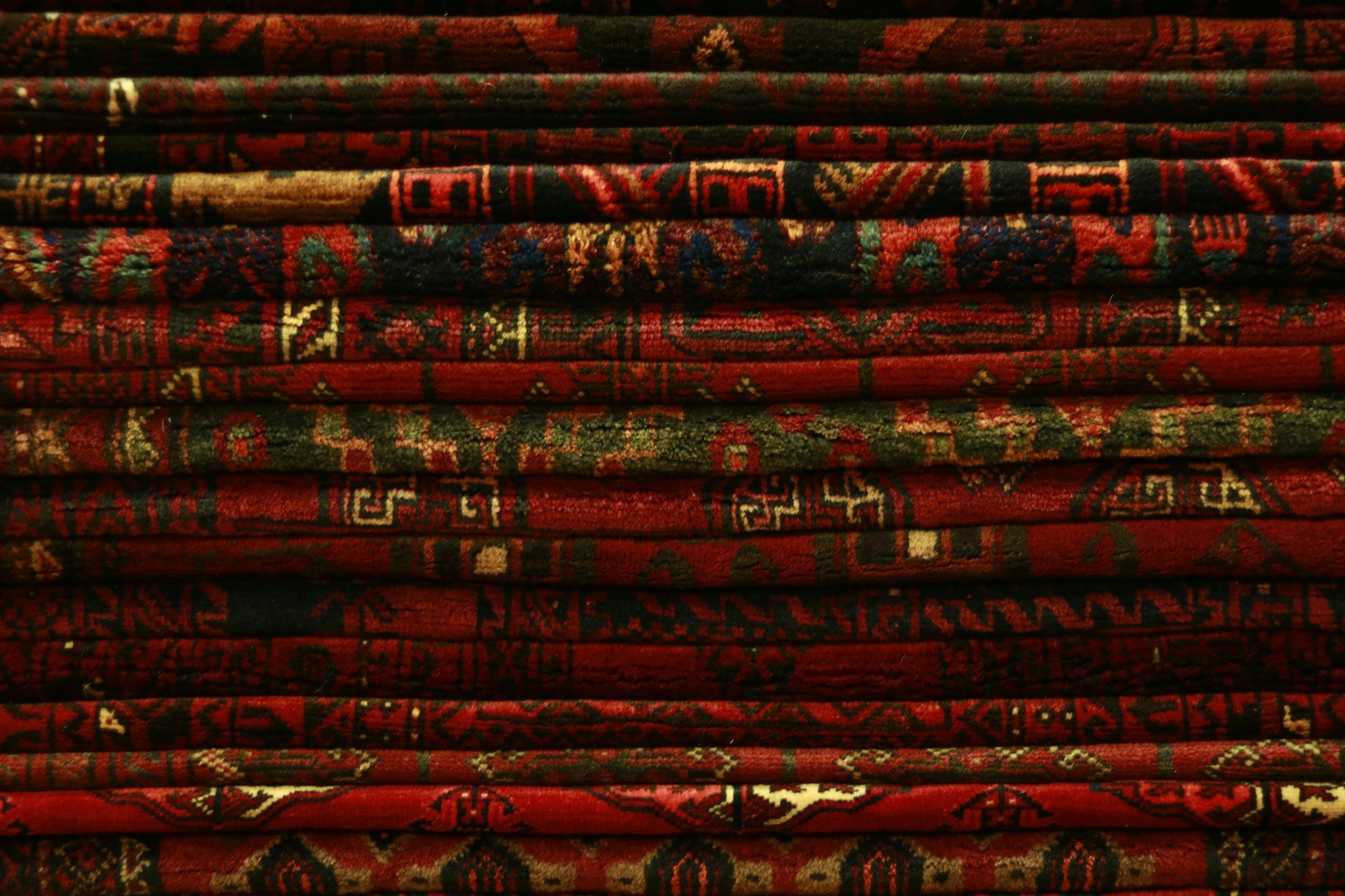 stack of red textiles