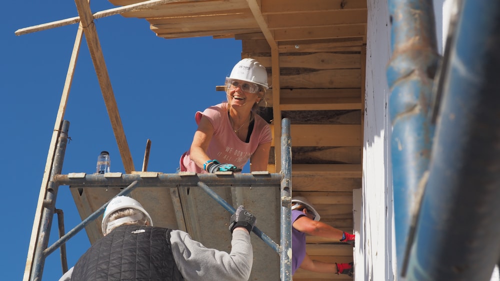 woman wearing pink t-shirt during daytime