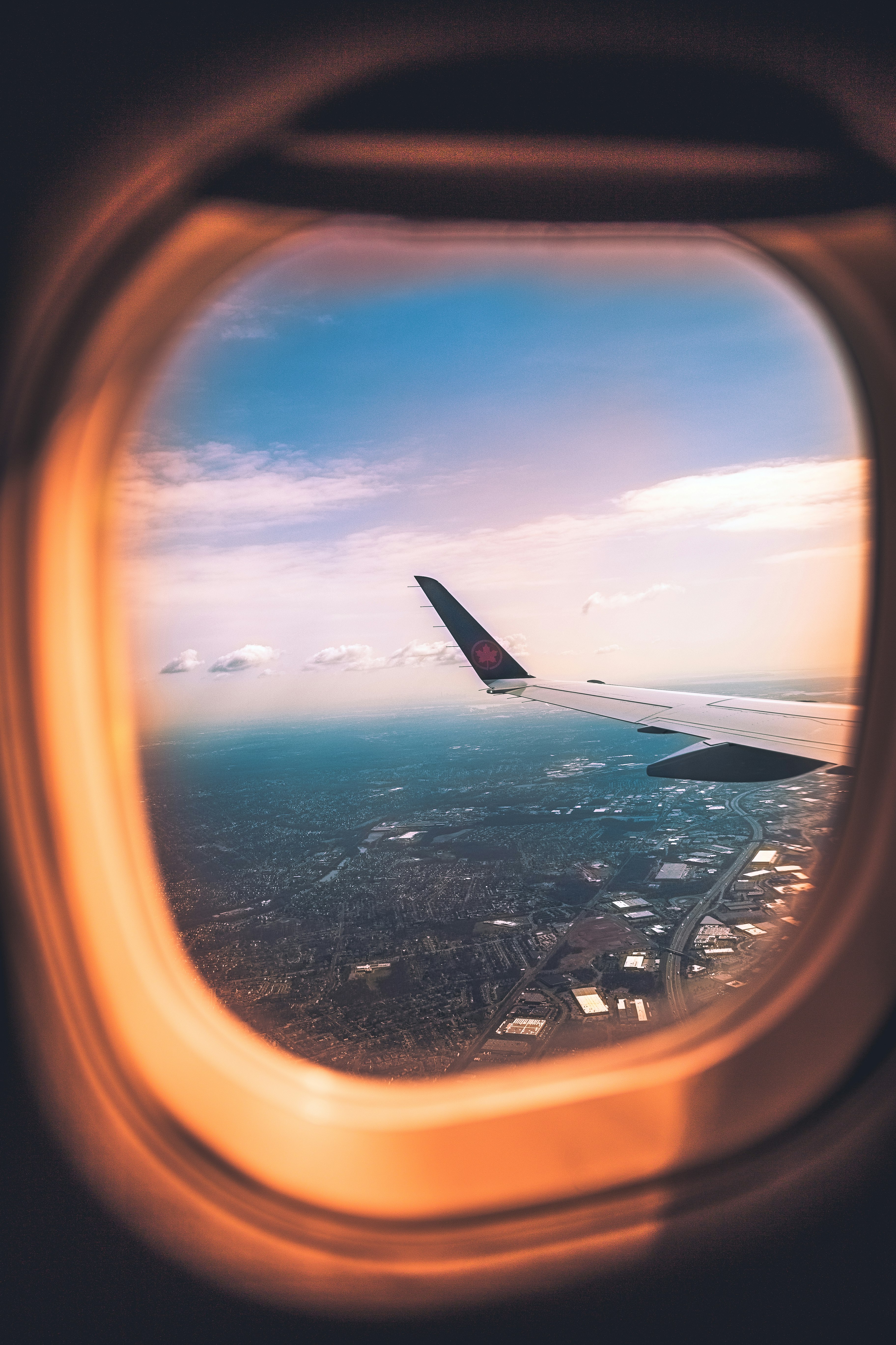 airplane window during daytime photo