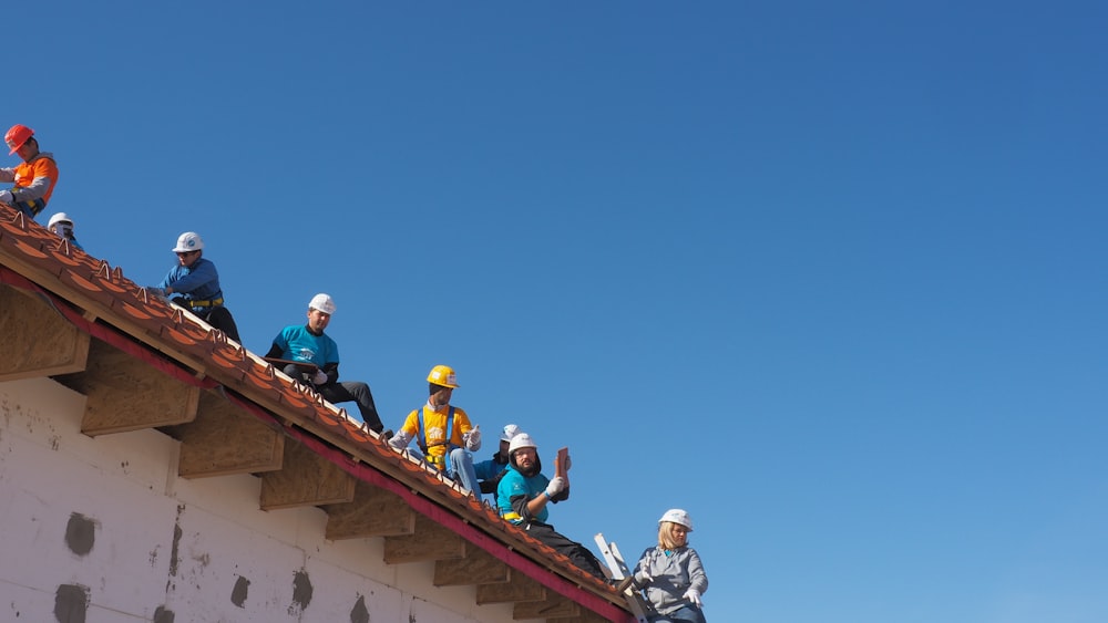 people on roof top during daytime