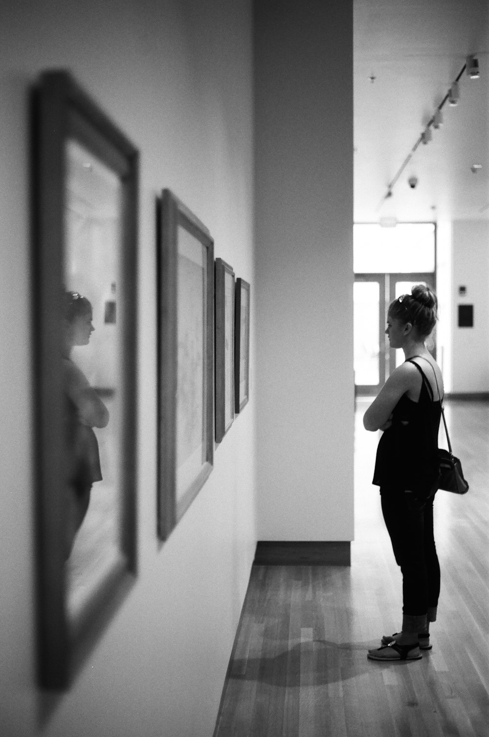 woman wears black dress