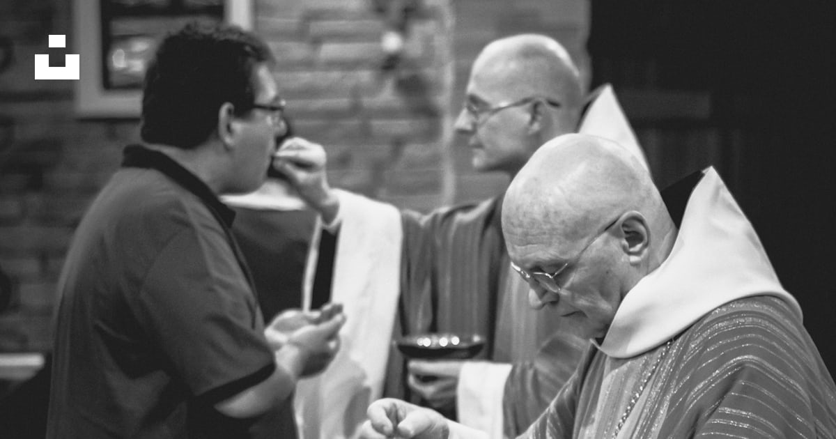 Two priests giving Eucharist photo – Free Priest Image on Unsplash