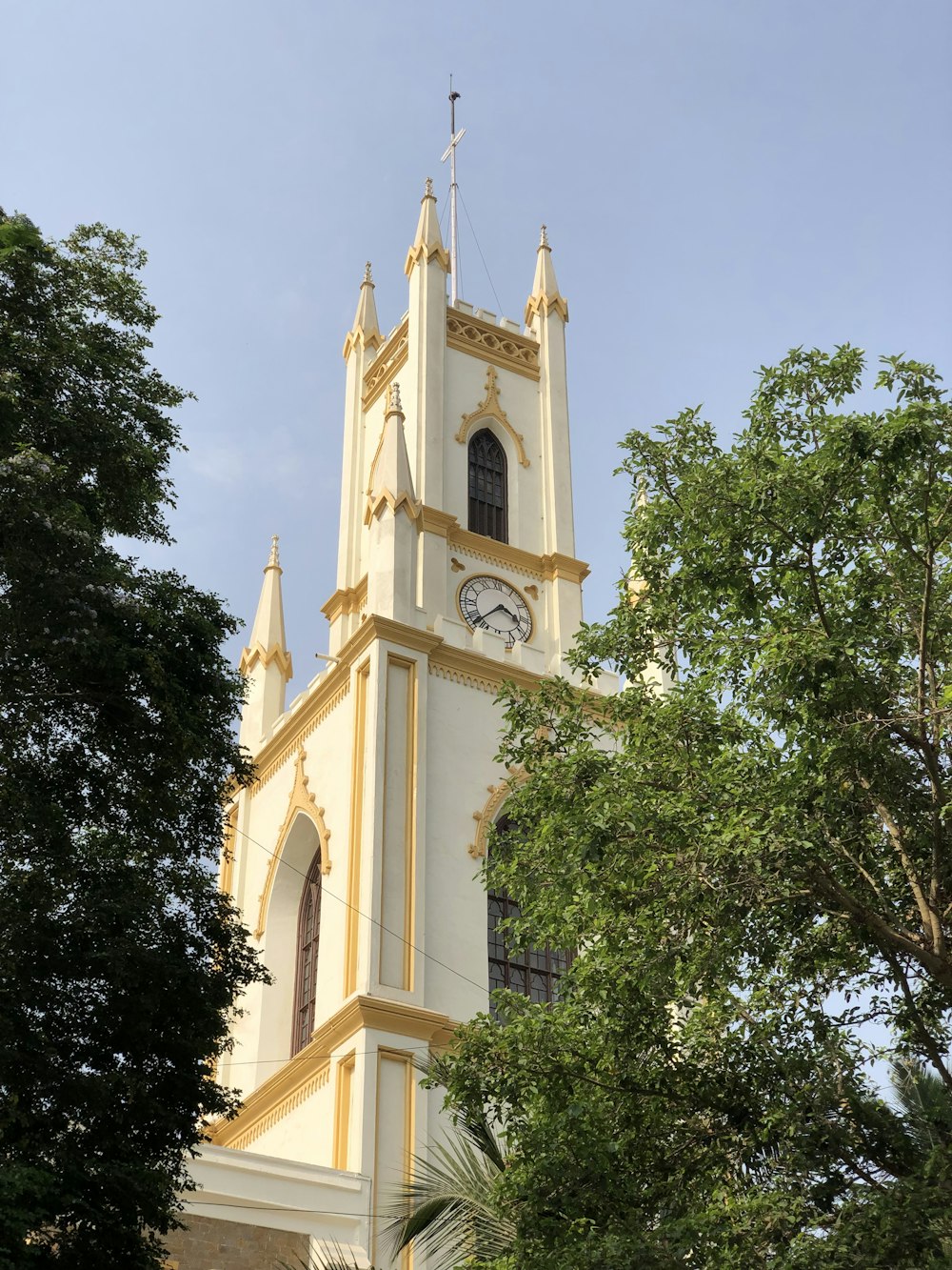 white and gold cement tower