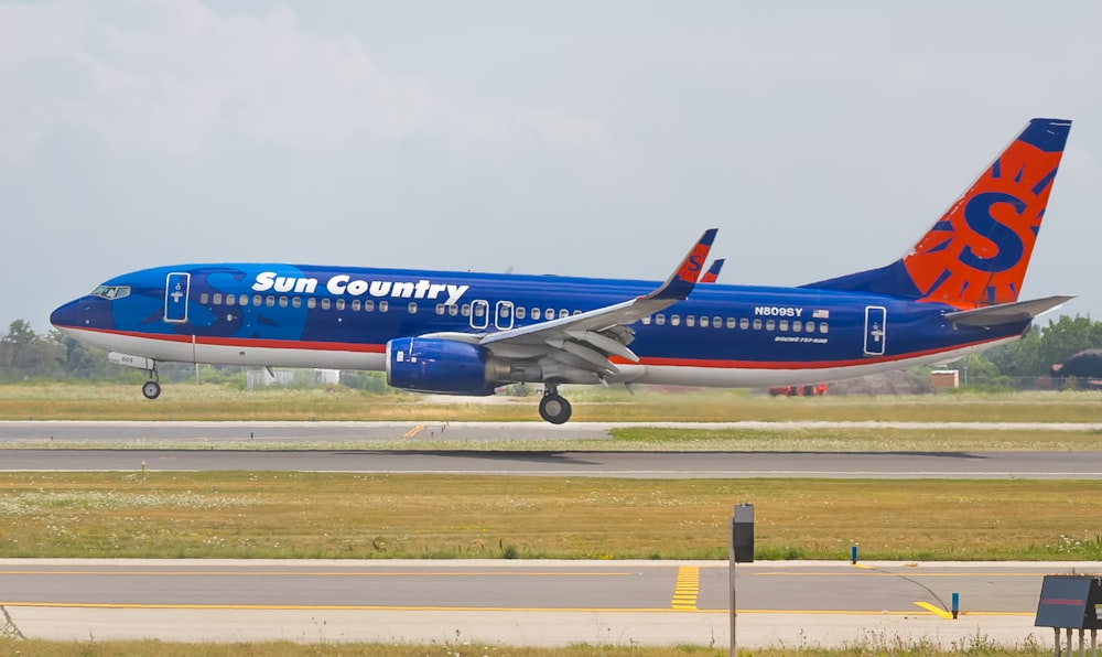 blue and red airplane photo – Free Toronto Image on Unsplash