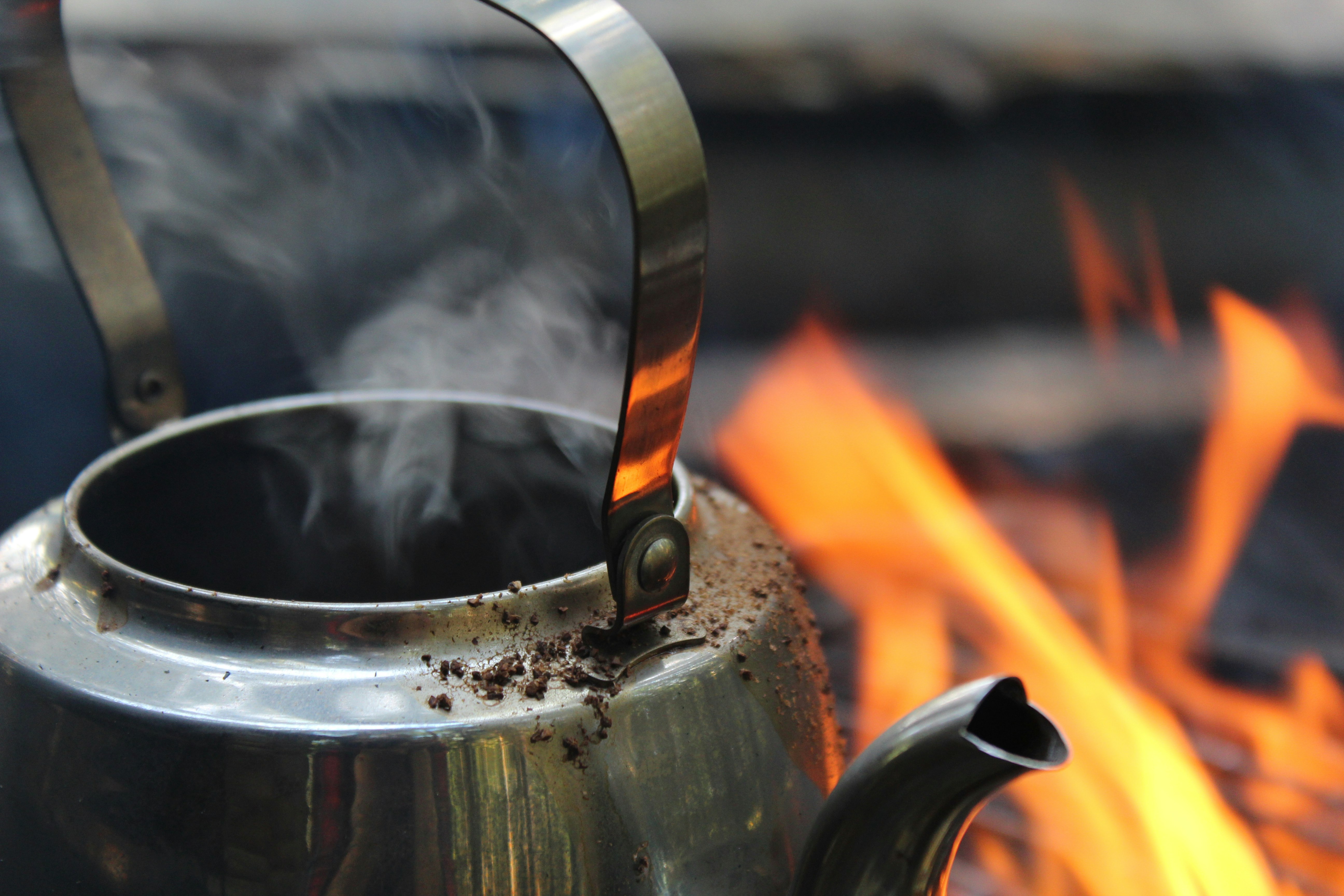 hot kettle beside fire