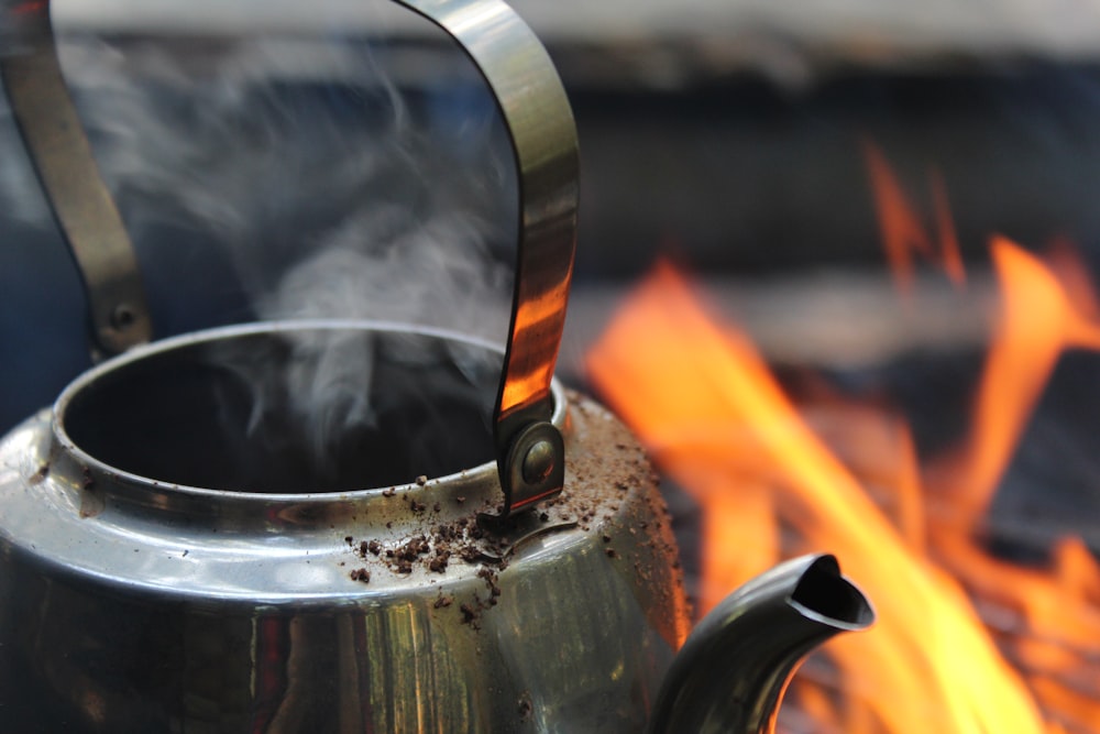 hot kettle beside fire