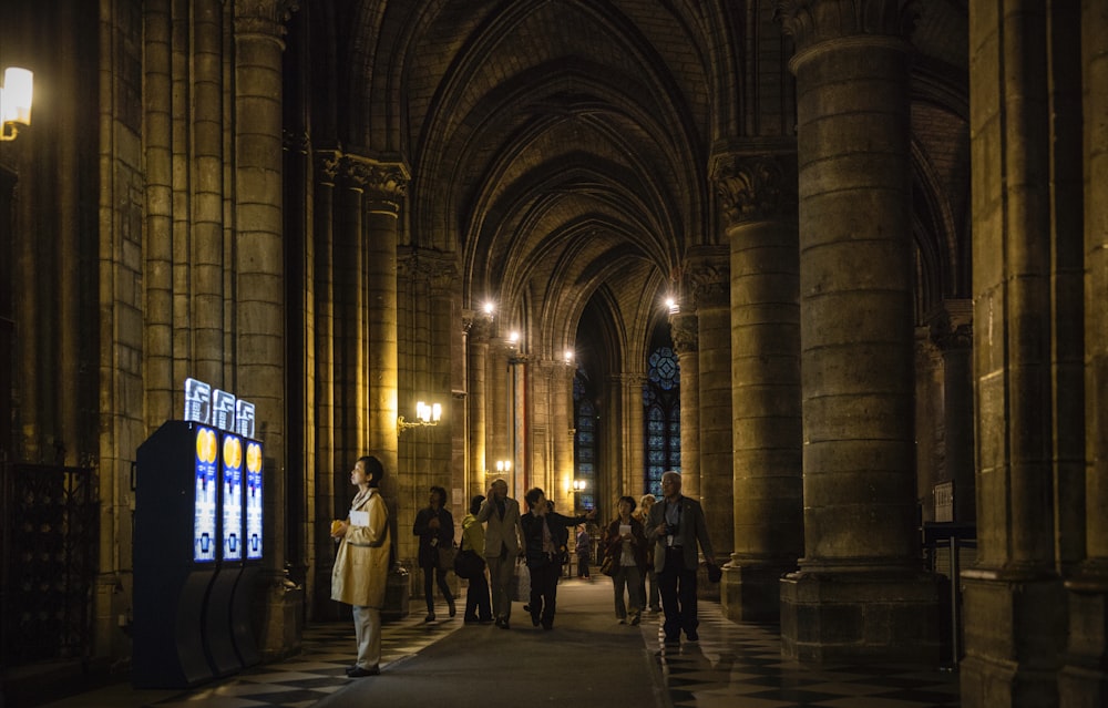 people walking in building