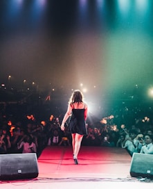 woman walking on stage