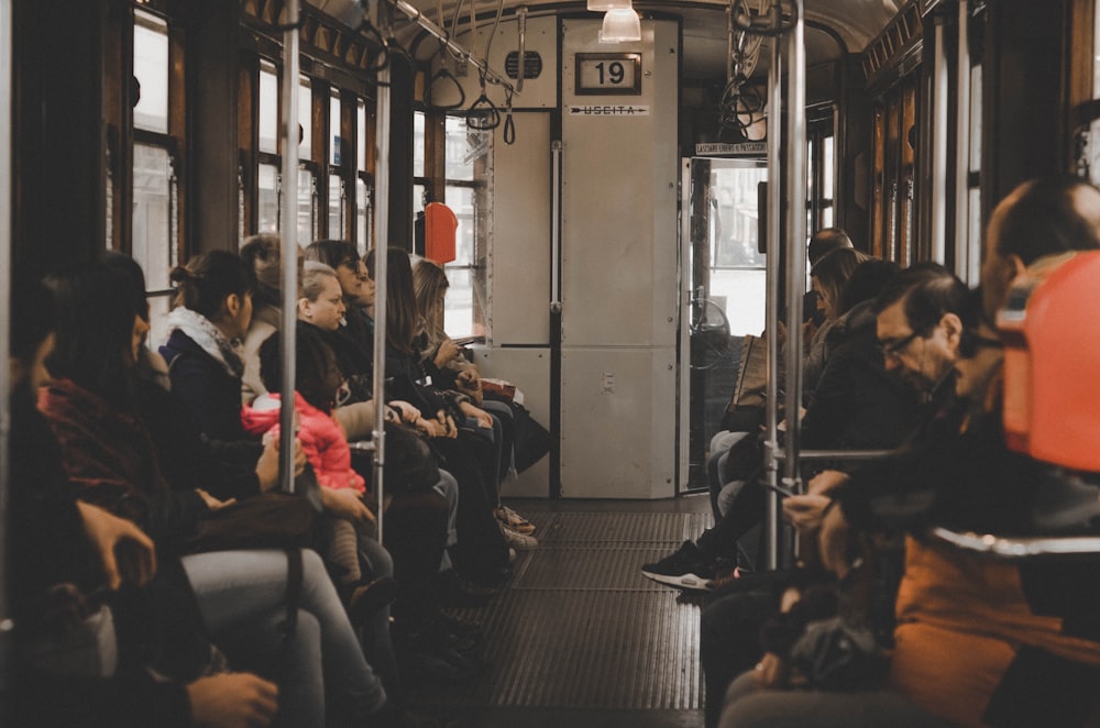 people sitting in train