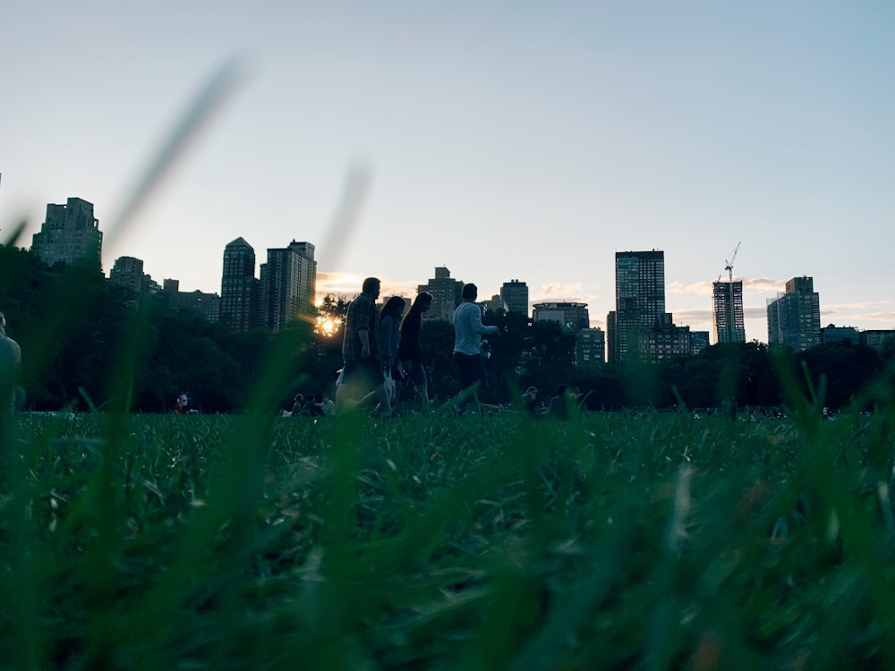 people near buildings during daytime