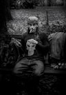 man sitting on bench