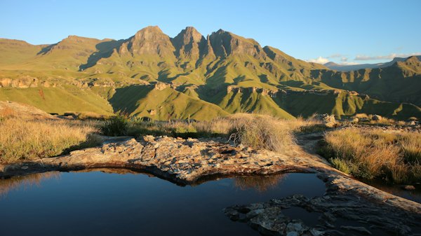Peaks above a mountain pool — Drakensberg, South Africa