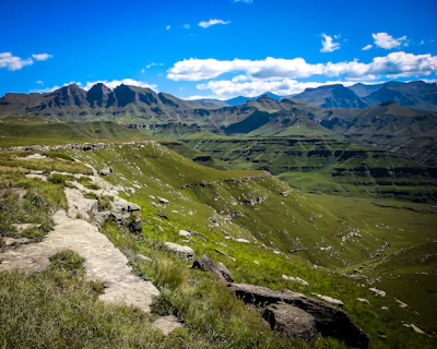 Green slopes running up to the escarpment — Drakensberg, South Africa