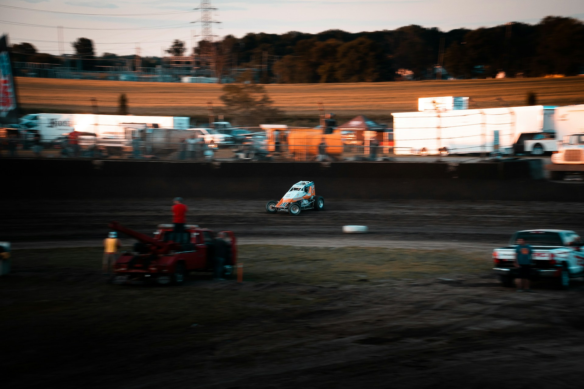 A close-up shot of a dirt kart kicking up dust as it speeds around a bend at 221 Speedway in Wrens, GA.