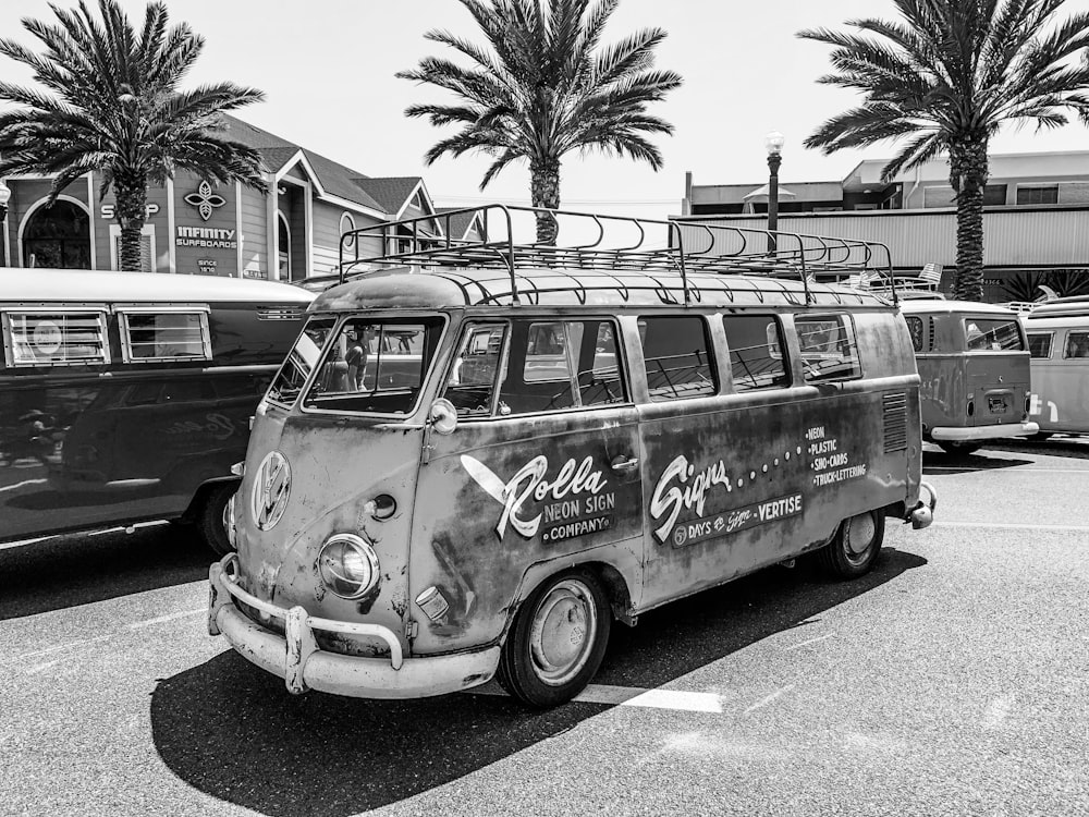 classic Volkswagen van parked beside palm trees