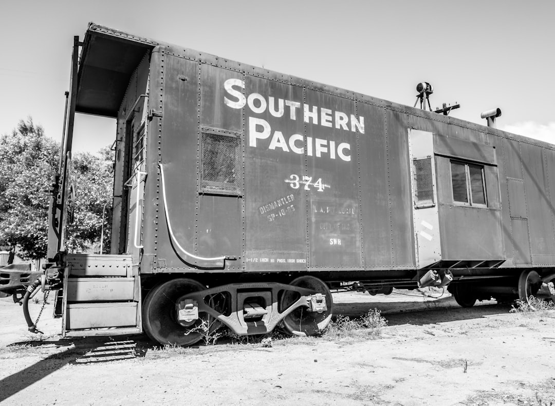 grayscale photo of Southern Pacific train