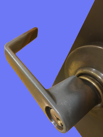 Close-up of a sturdy commercial door handle and lock mechanism.