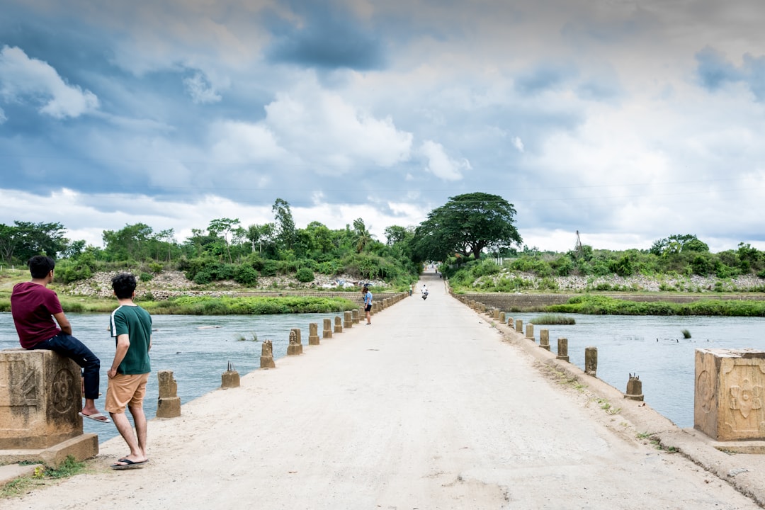 people on bridge during day