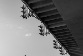 Artistic shot of a uniquely designed traffic light with vibrant colors and sharp angles.