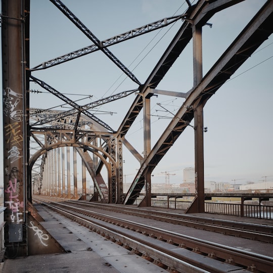 brown metal train rail in Sachsenhausen-Nord Germany