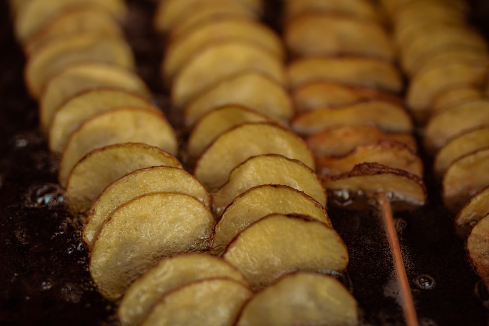 a close up of food cooking on a grill