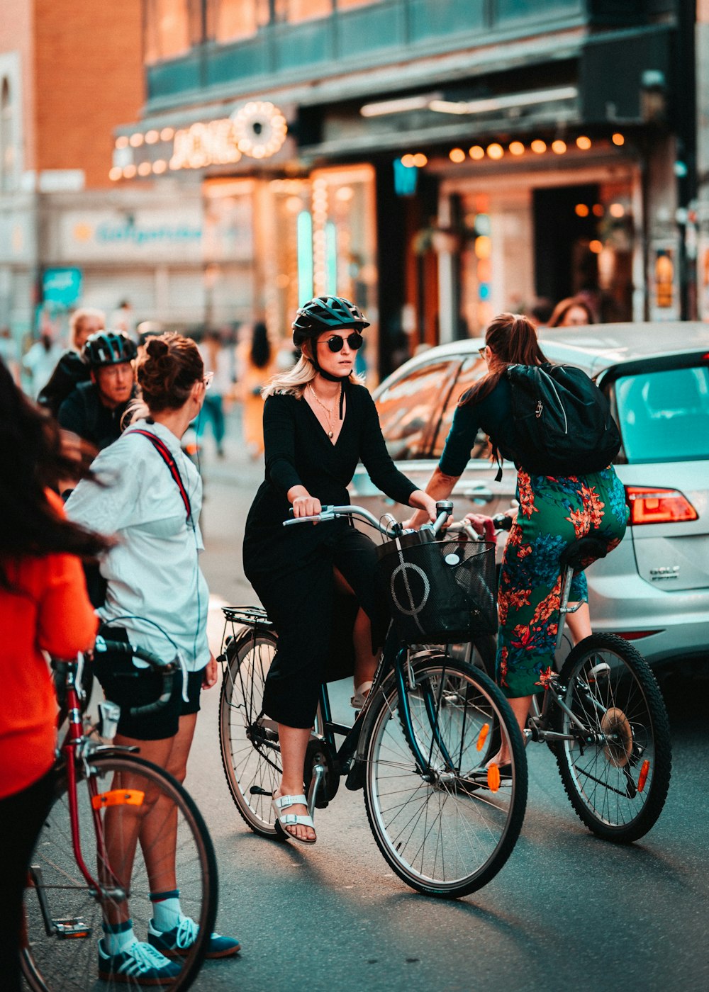 woman riding bicycle near road during daytime