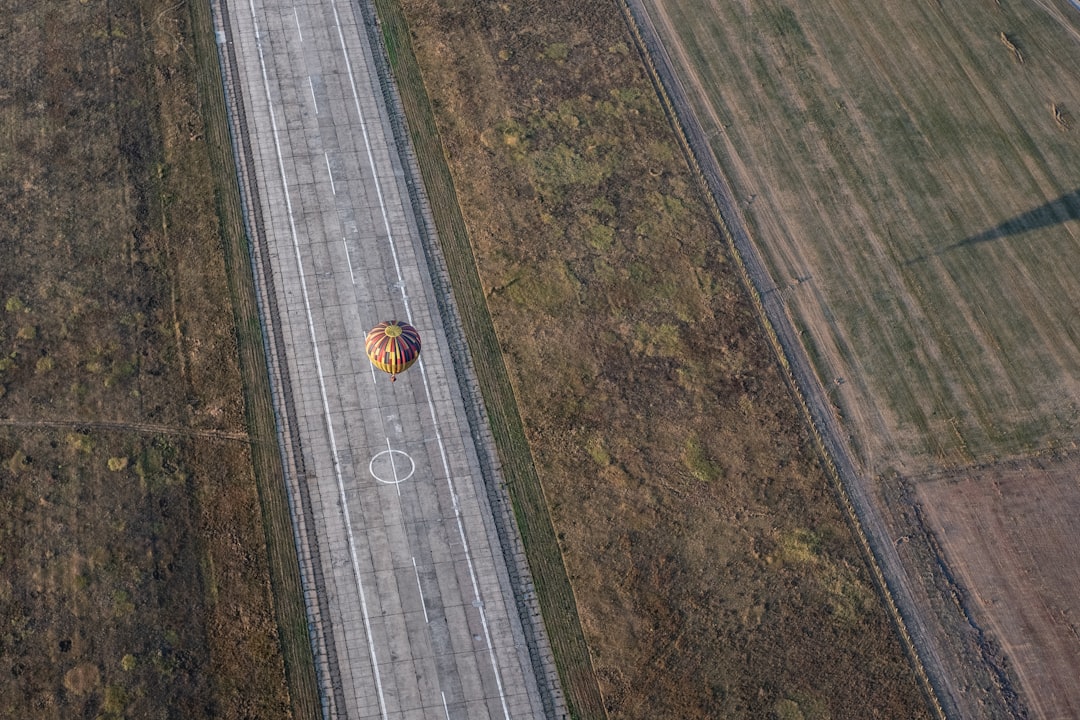 yellow and red striped balloon