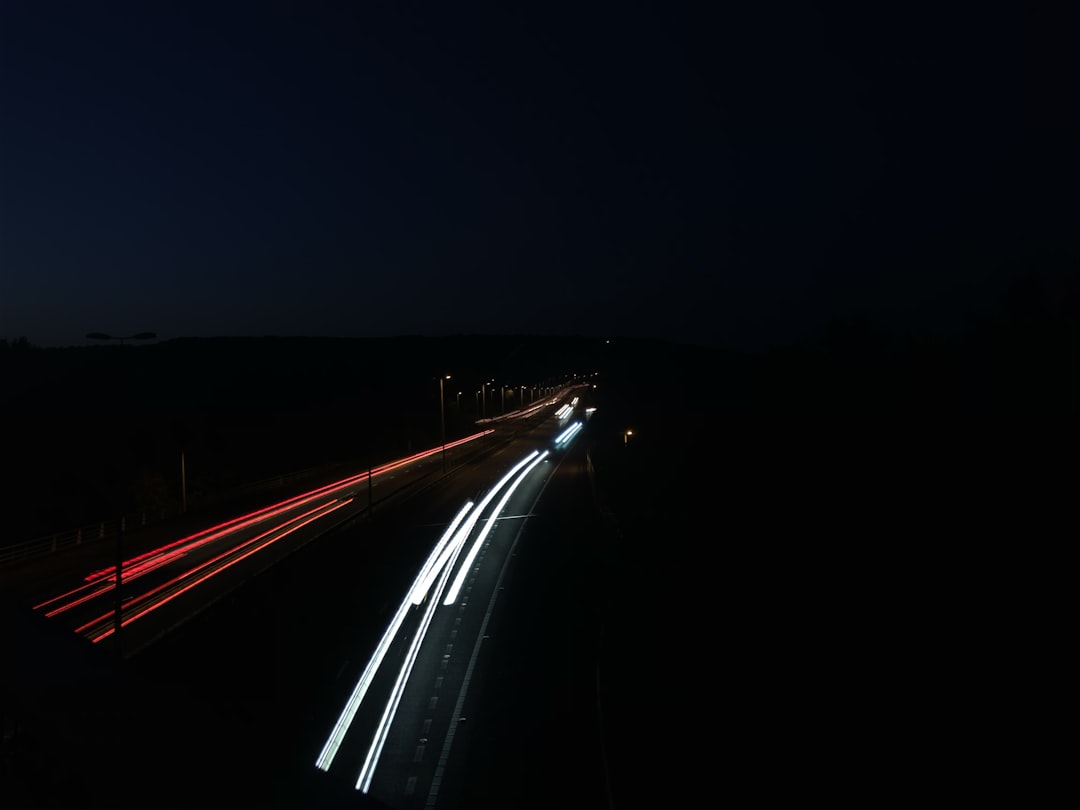 timelapse photo of vehicles on road