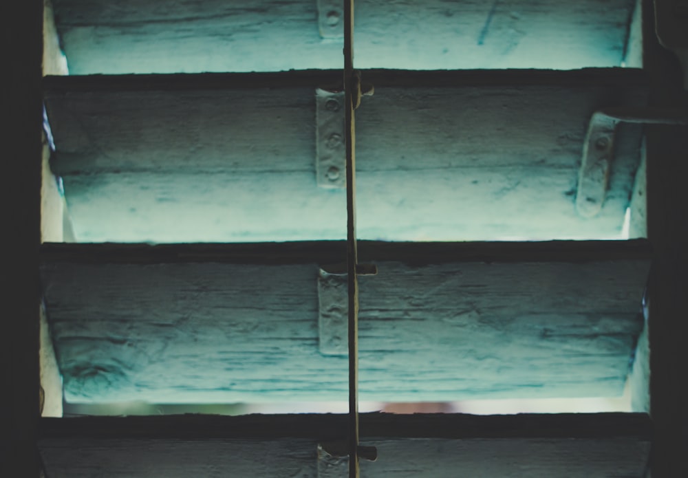 close up photography of wooden window